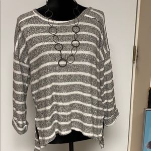 Gray and white sweater